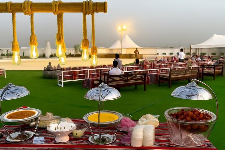 Premium Dubai Desert Safari: Dune Bashing, Sandboarding, Camel Ride & BBQ Experience photo 3