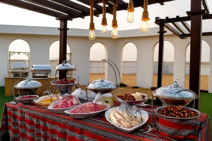Premium Dubai Desert Safari: Dune Bashing, Sandboarding, Camel Ride & BBQ Experience photo 4