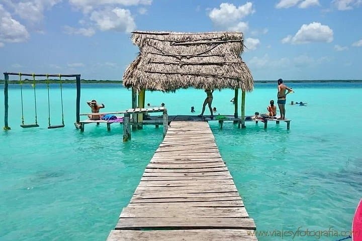 Bacalar Day Trip from Cancun: Lake of Seven Colors & Cenote Azul in One Day photo 1