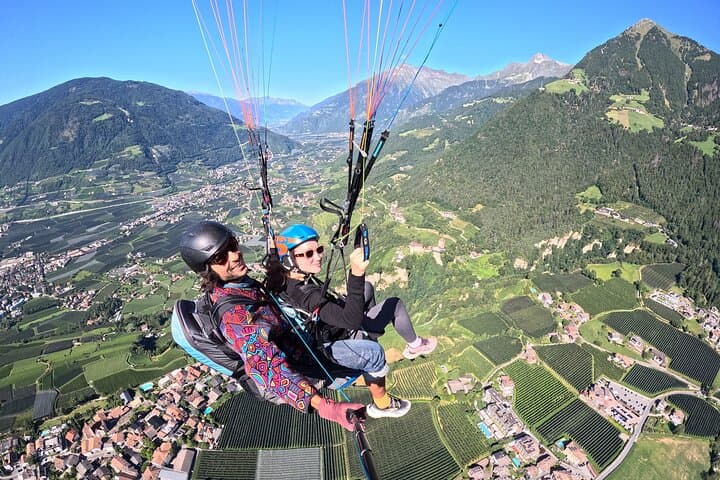 Tandem Paragliding Over Dorf Tirol: Soar Above Merano's Alps photo 2