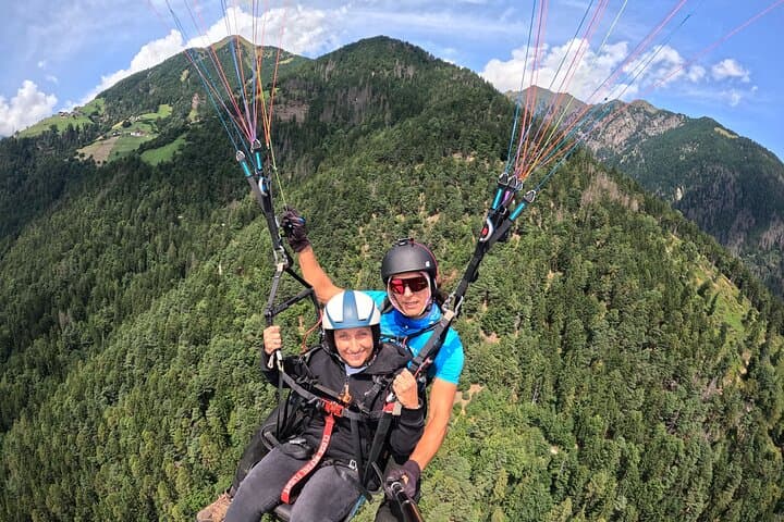 Tandem Paragliding Over Dorf Tirol: Soar Above Merano's Alps photo 3