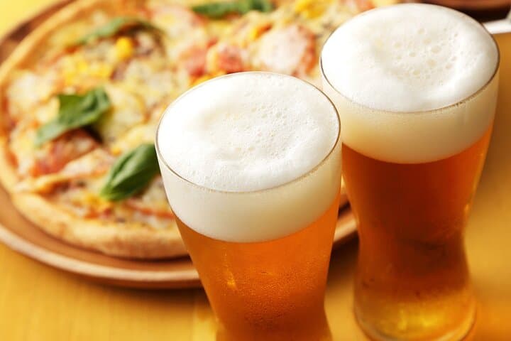 London Pizza & Beer Bus Experience: 90-Min Double-Decker Sightseeing with Pizza & Drinks