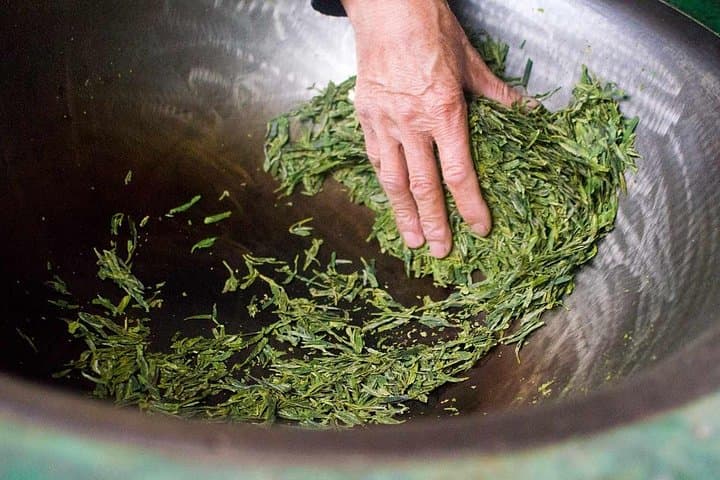 Hands-On Longjing Tea Day Tour in Hangzhou: Tea Picking, Pan-Roasting & West Lake photo 3
