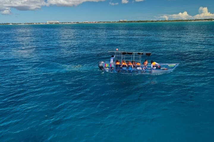 Invisible Boat to Rainbow Reef & Papa Doc Wreck — Clear-Hull Cruise from Freeport photo 3