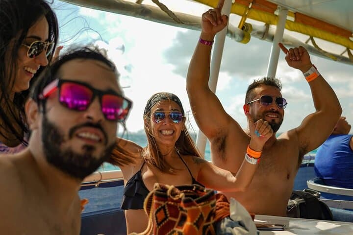 Isla Mujeres Party Catamaran: Snorkel, Buffet & Sunset Cruise from Cancun