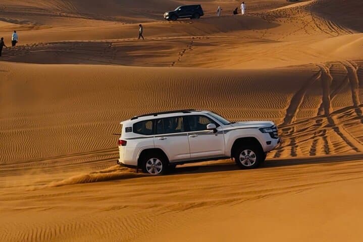 Morning Desert Safari in Dubai: Dune Bashing, Camel Ride & Sandboarding photo 5