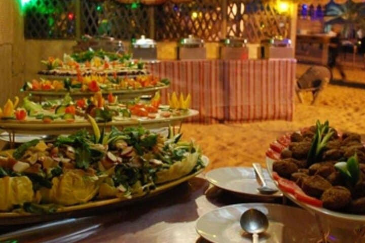 Dubai Desert Safari: Quad Bike, Sandboarding, Camel Ride & BBQ Experience photo 3