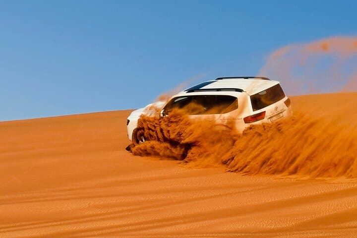 Dubai Sunrise Desert Safari: Dune Bashing, Camel Ride & Arabic Breakfast photo 2