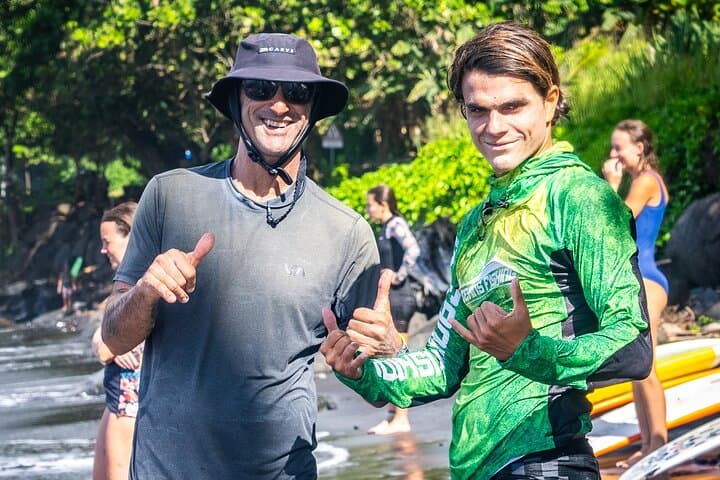 Ride Warm Waves: Group Guided Surfing Lessons on Tahiti's Black-Sand East Coast photo 5