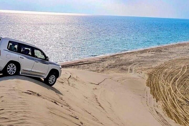 Doha Desert Safari & Inland Sea Tour — 4x4 Dune Bashing, Sandboarding & Camel Ride
