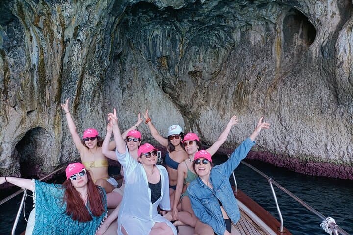 Capri Boat Tour: Blue Grotto, Faraglioni & Swimming Stops photo 2