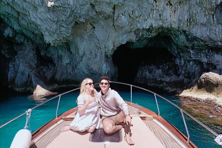 Capri Boat Tour: Blue Grotto, Faraglioni & Swimming Stops photo 3