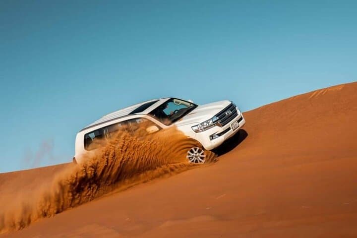 Dubai Morning Desert Safari: Dune Bashing, Camel Ride & Sandboarding