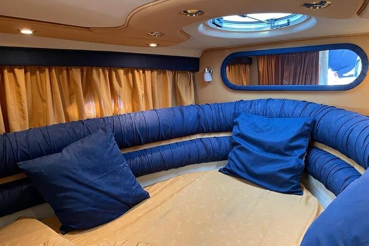 Taormina Private Yacht Tour: Isola Bella, Blue Grotto & Mount Etna Views photo 4