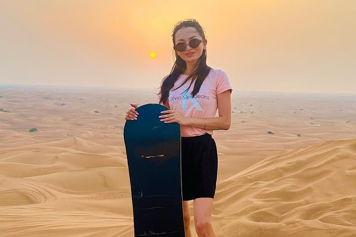 Dubai Red Dunes Sunrise Safari: Camel Ride, Sandboarding & Falcon Encounter photo 3