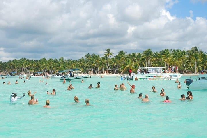 Saona Island Full-Day Adventure: Parasailing, Snorkeling & Beach Lunch from Punta Cana photo 1