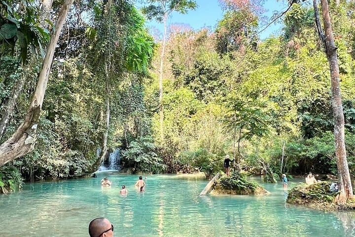 Kuang Si Waterfall and Pak Ou Caves Tour — Luang Prabang Day Trip to Turquoise Falls & Sacred Caves photo 4