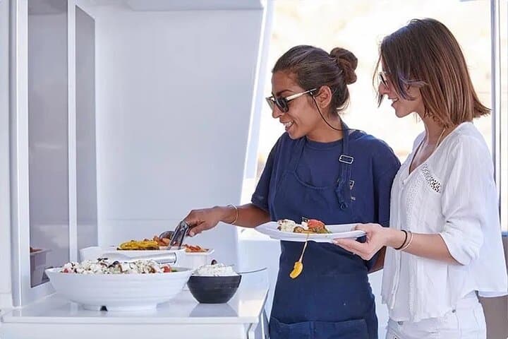 Santorini Gold Catamaran Cruise: Sunset BBQ, Snorkeling & Volcano Hot Springs photo 3