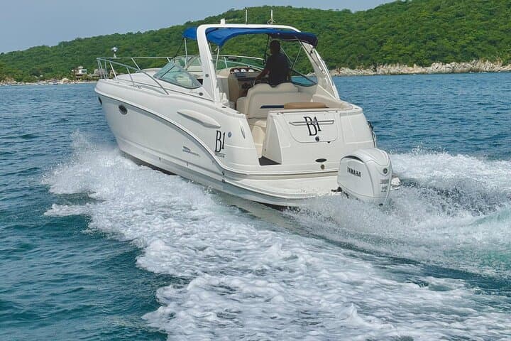 Sail the Bays of Huatulco: 7-Hour Luxury Yacht Snorkel Cruise with Drinks photo 2