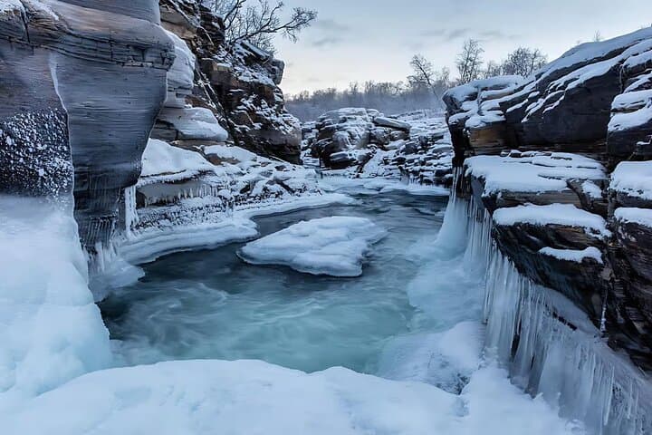 Abisko & Björkliden Day Trip from Kiruna — Silver Waterfall, Canyon & Lunch photo 2