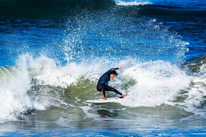 Carcavelos Surf Lesson with Pro Luis Perloiro — Lisbon Pickup and 1.5‑Hour Ocean Session photo 3