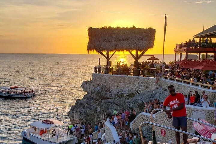 Discover Negril's Iconic Rick's Cafe and 7 Mile Beach Tour