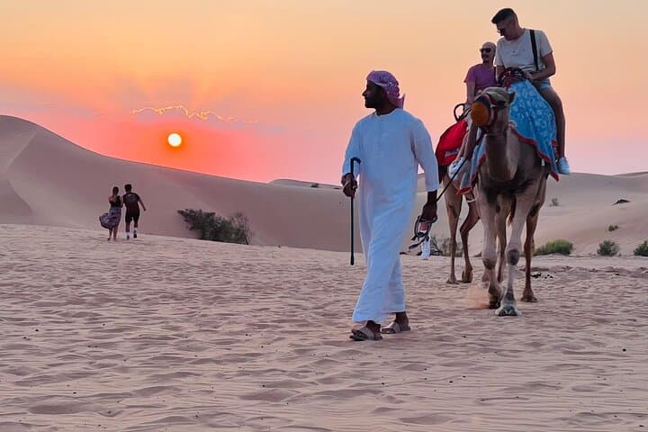 Abu Dhabi Evening Desert Safari: Dune Bashing, BBQ Dinner & Live Shows photo 3