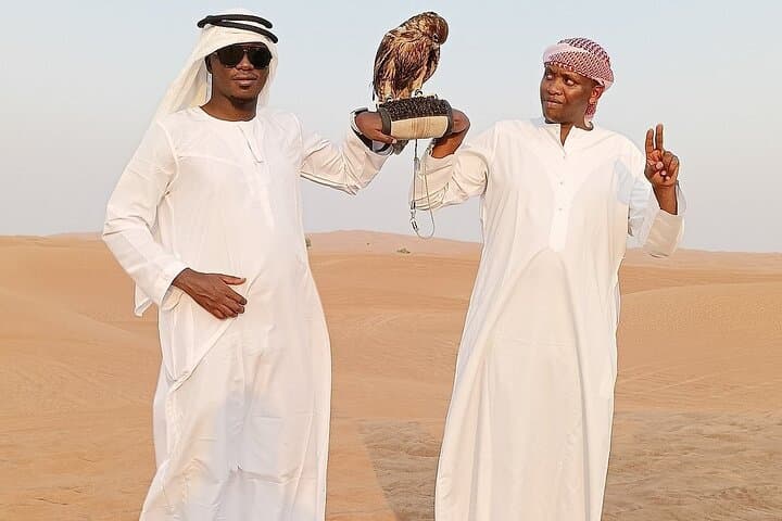 Evening Desert Safari Dubai — Red Dunes, Camel Ride & BBQ Guide photo 4