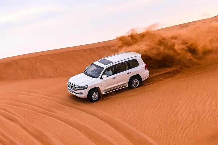 Dubai Desert Safari: Dune Bashing, Camel Ride, Quad & Cultural Camp Experience