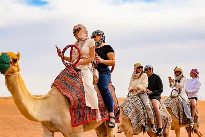 Dubai Desert Safari: Dune Bashing, Camel Ride, Quad & Cultural Camp Experience photo 3