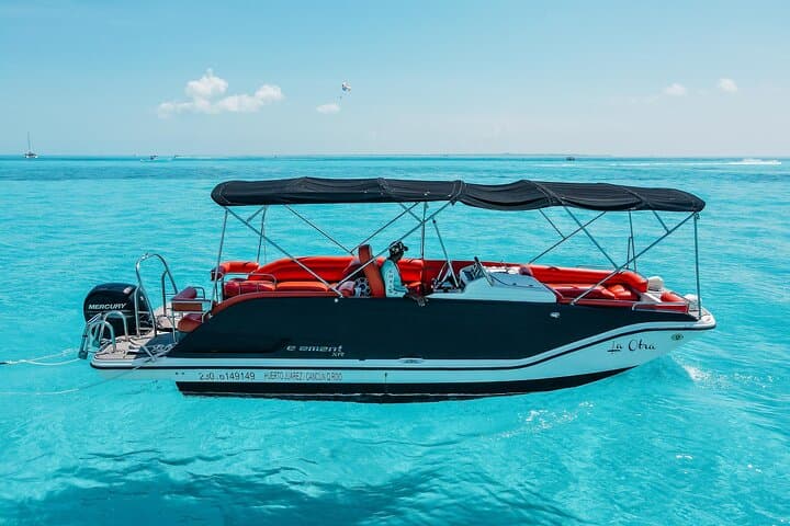 Private Cancun Boat Trip to Isla Mujeres — Snorkel Turquoise Reefs & North Beach Relaxation
