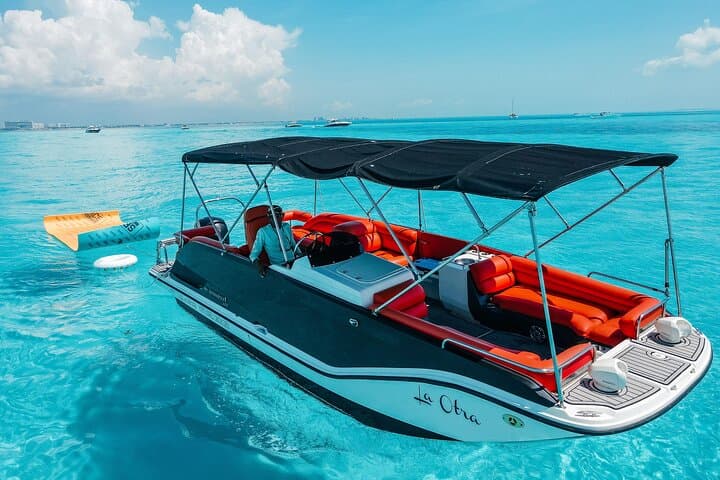 Private Cancun Boat Trip to Isla Mujeres — Snorkel Turquoise Reefs & North Beach Relaxation photo 2