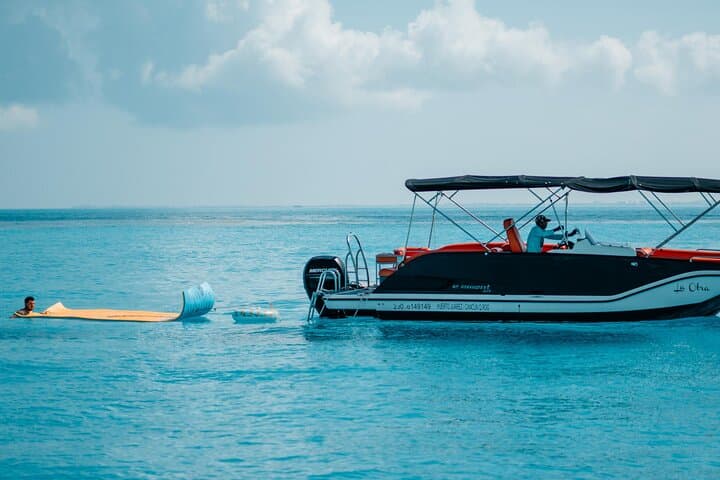 Private Cancun Boat Trip to Isla Mujeres — Snorkel Turquoise Reefs & North Beach Relaxation photo 3