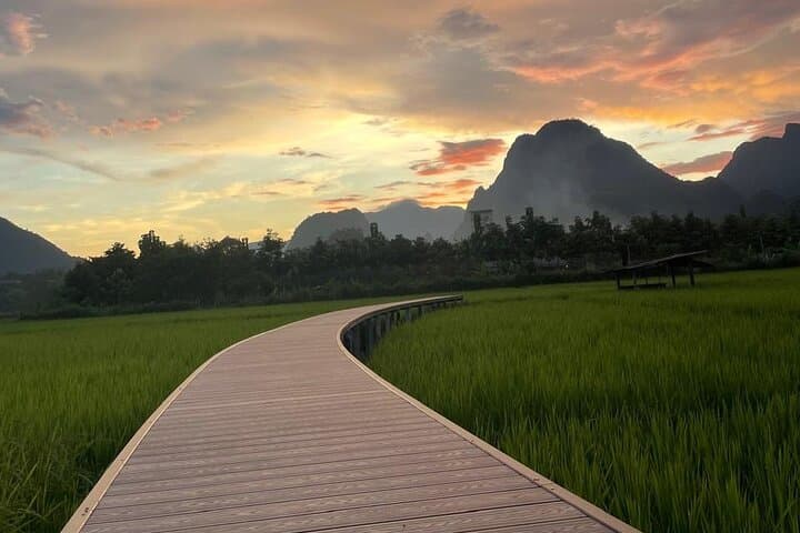 Vientiane to Vang Vieng: Full-Day Zipline, Caves, Kayak and Paragliding Adventure photo 1