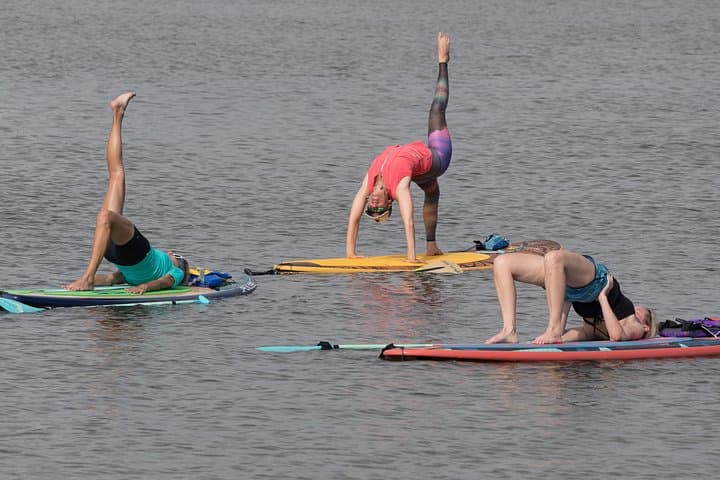 SUP Yoga on the Halifax River: Paddleboard Yoga near Daytona Beach photo 1