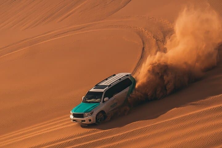 Dubai Sunset Desert Safari: Dune Bashing, Sandboarding & Camel Ride photo 2