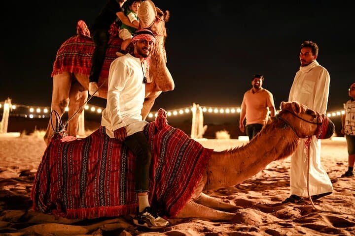 Abu Dhabi Evening Desert Safari: Dune Bashing, Camel Ride & BBQ Under the Stars photo 4