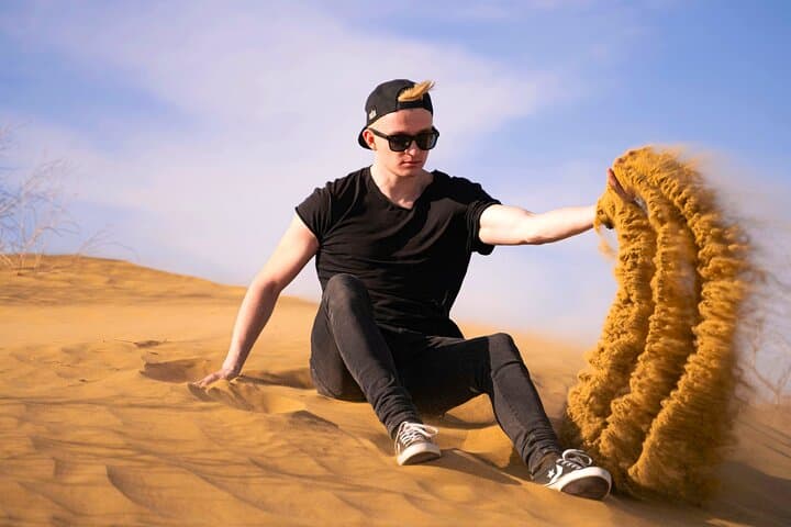 Abu Dhabi Evening Desert Safari: Dune Bashing, Camel Ride & BBQ Under the Stars photo 2