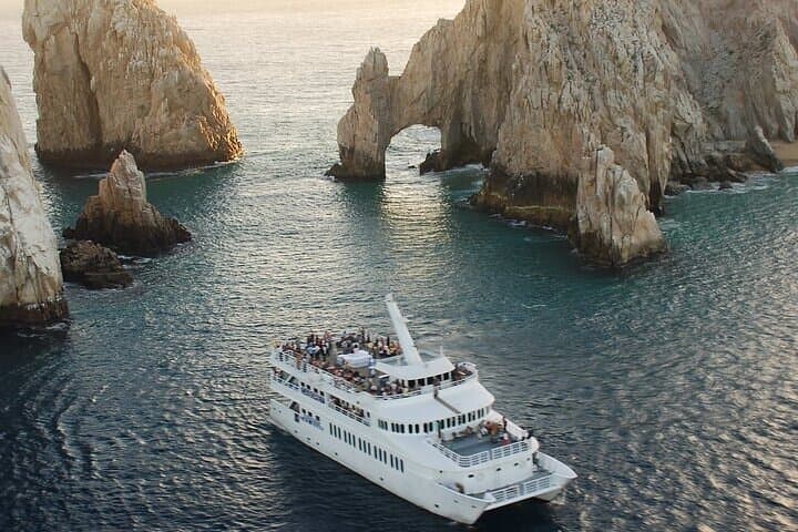 Cabo San Lucas Sunset Dinner Cruise — Premier Dinner with Live Music & Open Bar
