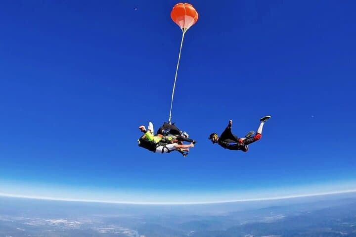 Skydiving Over Chongqing: Tandem Freefall with Photos & Video