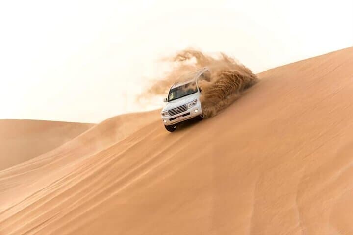 Qatar Desert Safari: Dune Bashing, Sandboarding & Inland Sea Tour