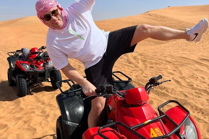 Red Sand Quad Bike Desert Safari in Lahbab – Dune Bashing, Camel Ride & BBQ in Dubai photo 2