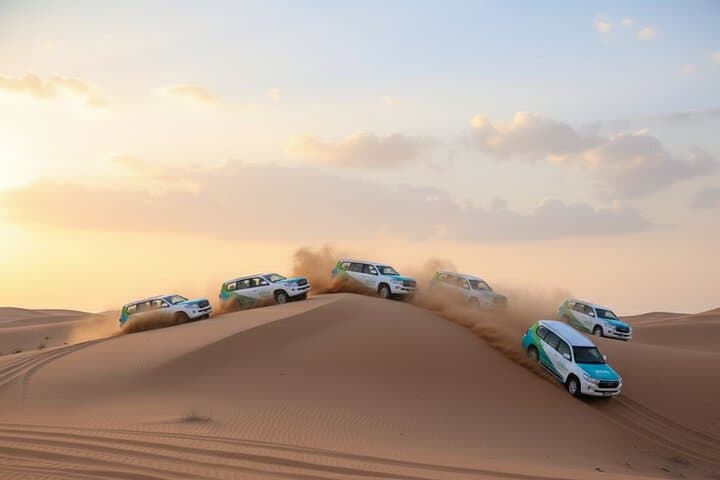Dubai Red Dunes Desert Safari — Dune Bashing, Camel Ride & BBQ Under the Stars photo 1