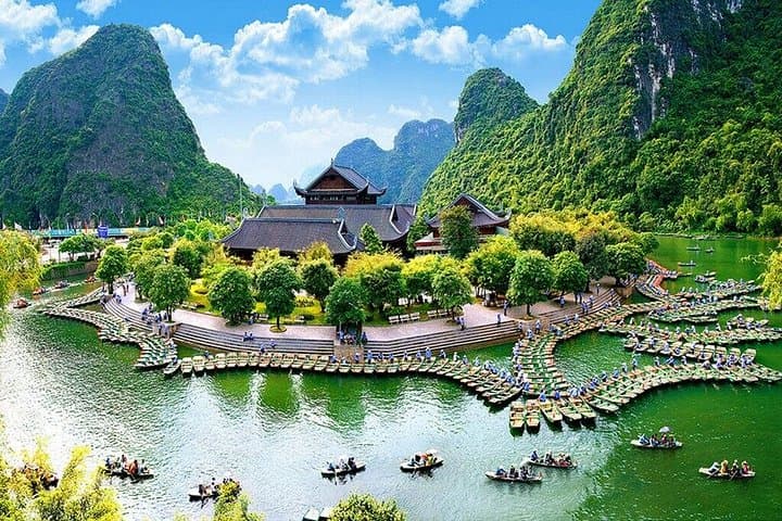 Hoa Lu, Trang An & Mua Cave Day Trip from Hanoi — Boat, Bike & 500-Step Viewpoint photo 4