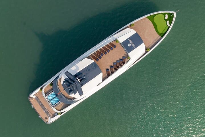 Modern Luxury Day Cruise: Ha Long & Lan Ha Bay with Kayak, Cave, and Cooking Class photo 6