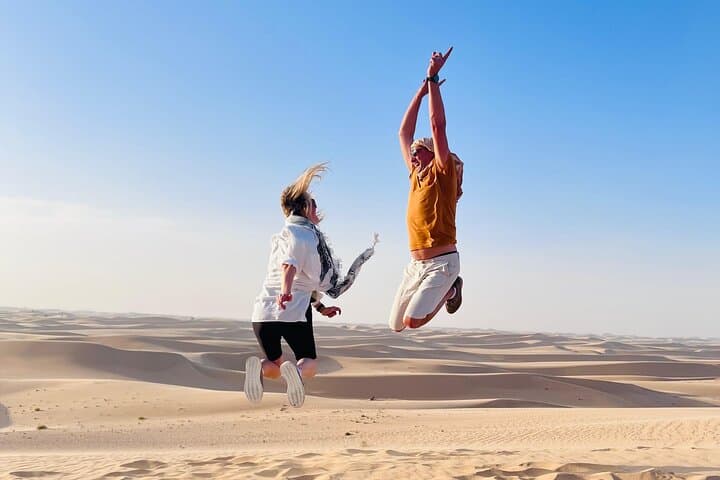 Abu Dhabi Evening Desert Safari: Dune Bashing, BBQ Dinner & Live Shows