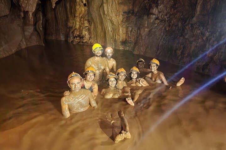 Phong Nha & Dark Cave Full-Day Adventure — River Boat, Caving, Zipline and Mud Bath photo 5