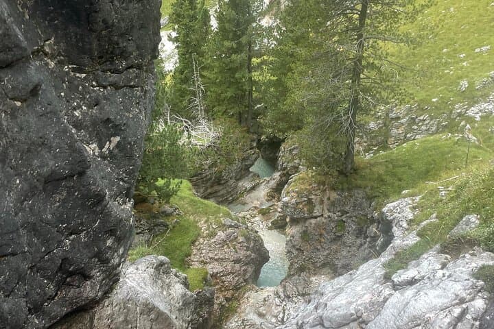 Dolomites Canyoning in Canazei: Guided Jumps, Rappels & Wetsuit Adventure