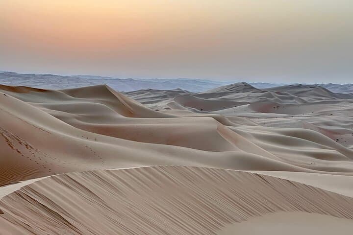 Sunrise Desert Safari with Camel Ride & Sandboarding — Private Abu Dhabi Tour photo 3