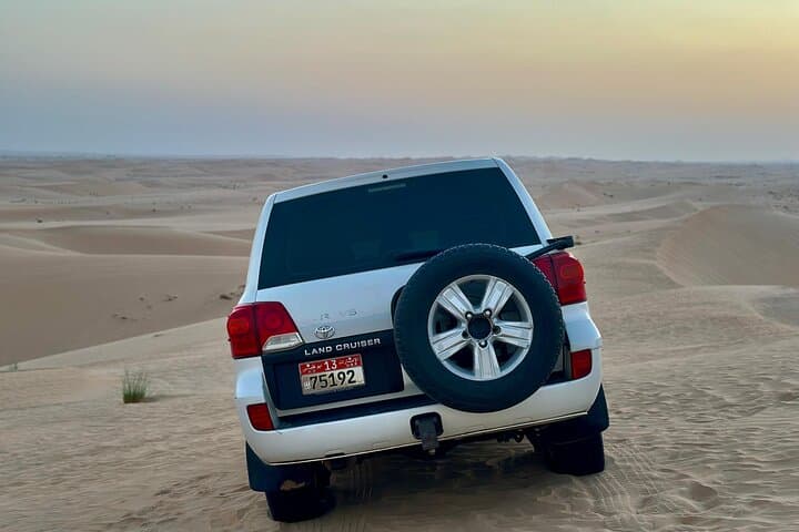 Sunrise Desert Safari with Camel Ride & Sandboarding — Private Abu Dhabi Tour photo 4